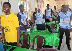 Some participants reciting the National Anthem
