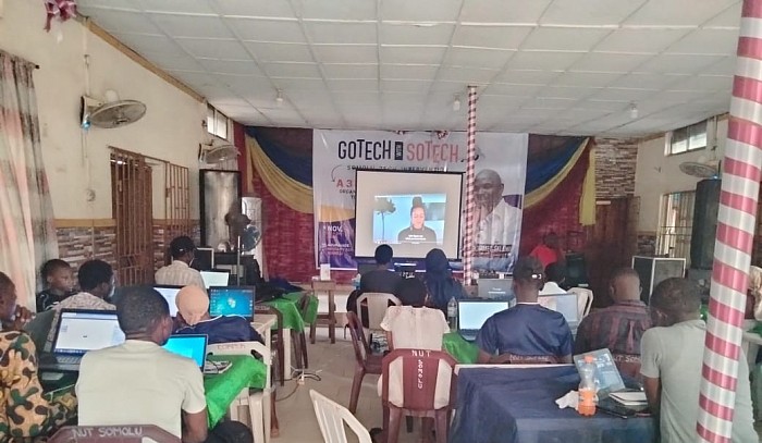 Some participants watching a video clip via projector